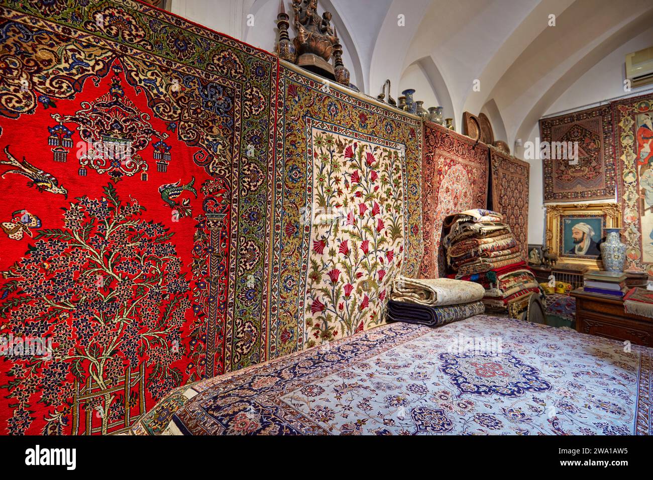 Colorful selection of handmade Persian carpets in a shop in the