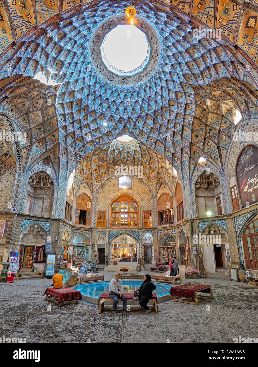 Domed ceiling with intricate geometric patterns in the Aminoddole Caravanserai, 16th century historic structure in the Grand Bazaar of Kashan, Iran. Stock Photo