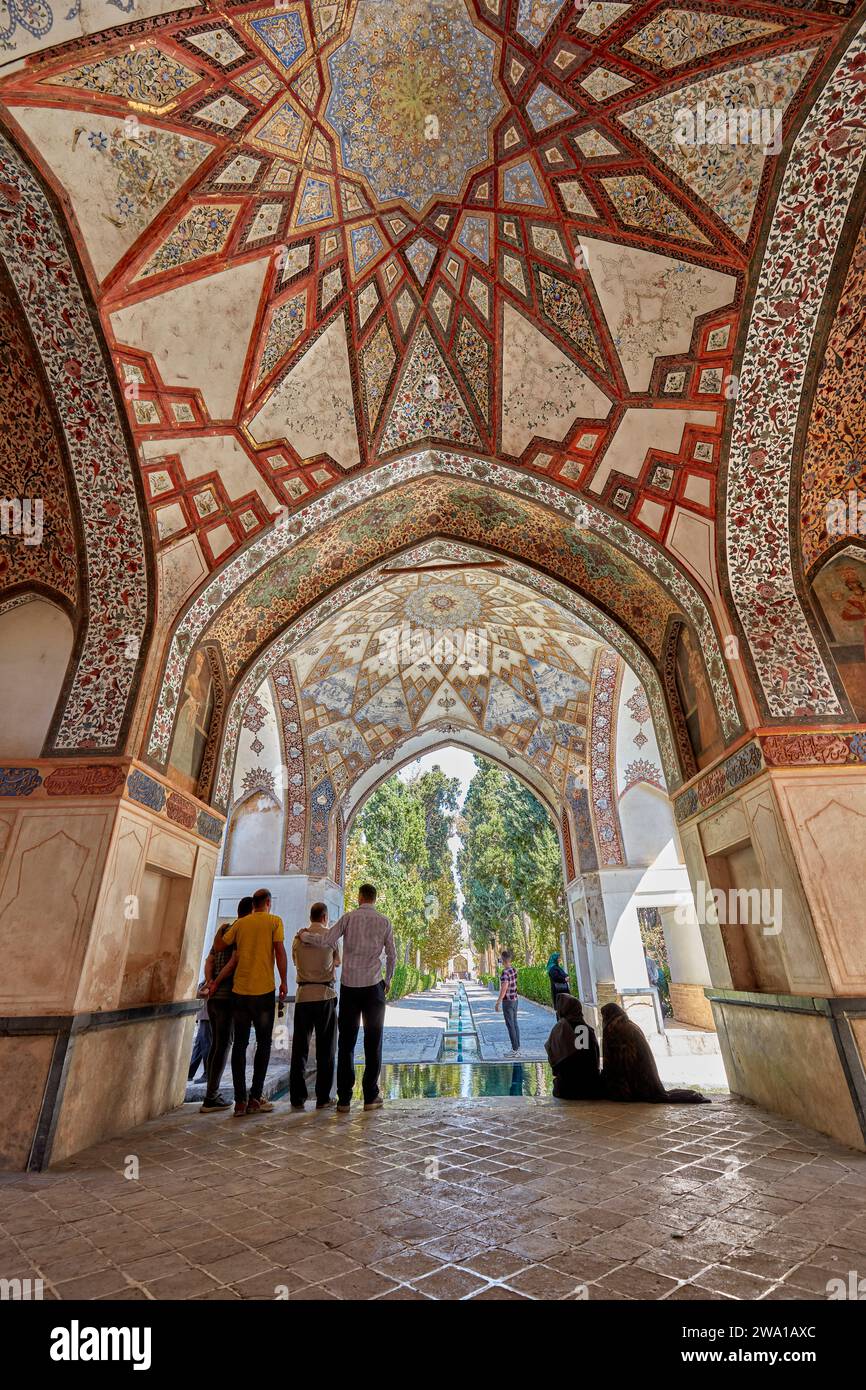 Tourists in the Qajar Pavilion in the Fin Garden (Bagh-e Fin), the oldest (1590) Persian Garden in Iran and UNESCO World Heritage Site. Kashan, Iran. Stock Photo