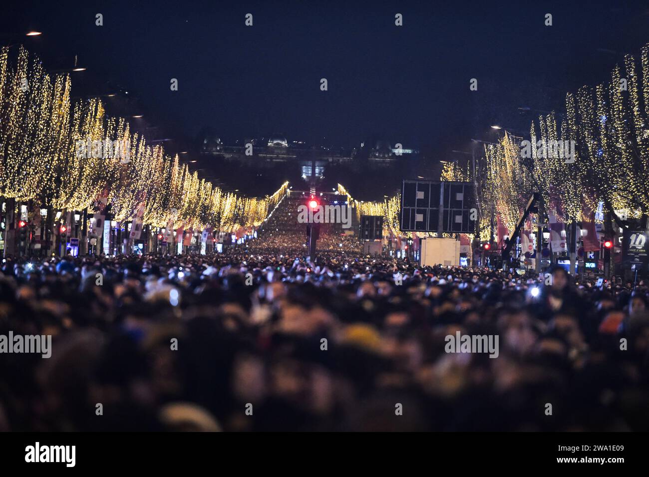 Paris, France. 01st Jan, 2025. Celebrators gather for the New Year's