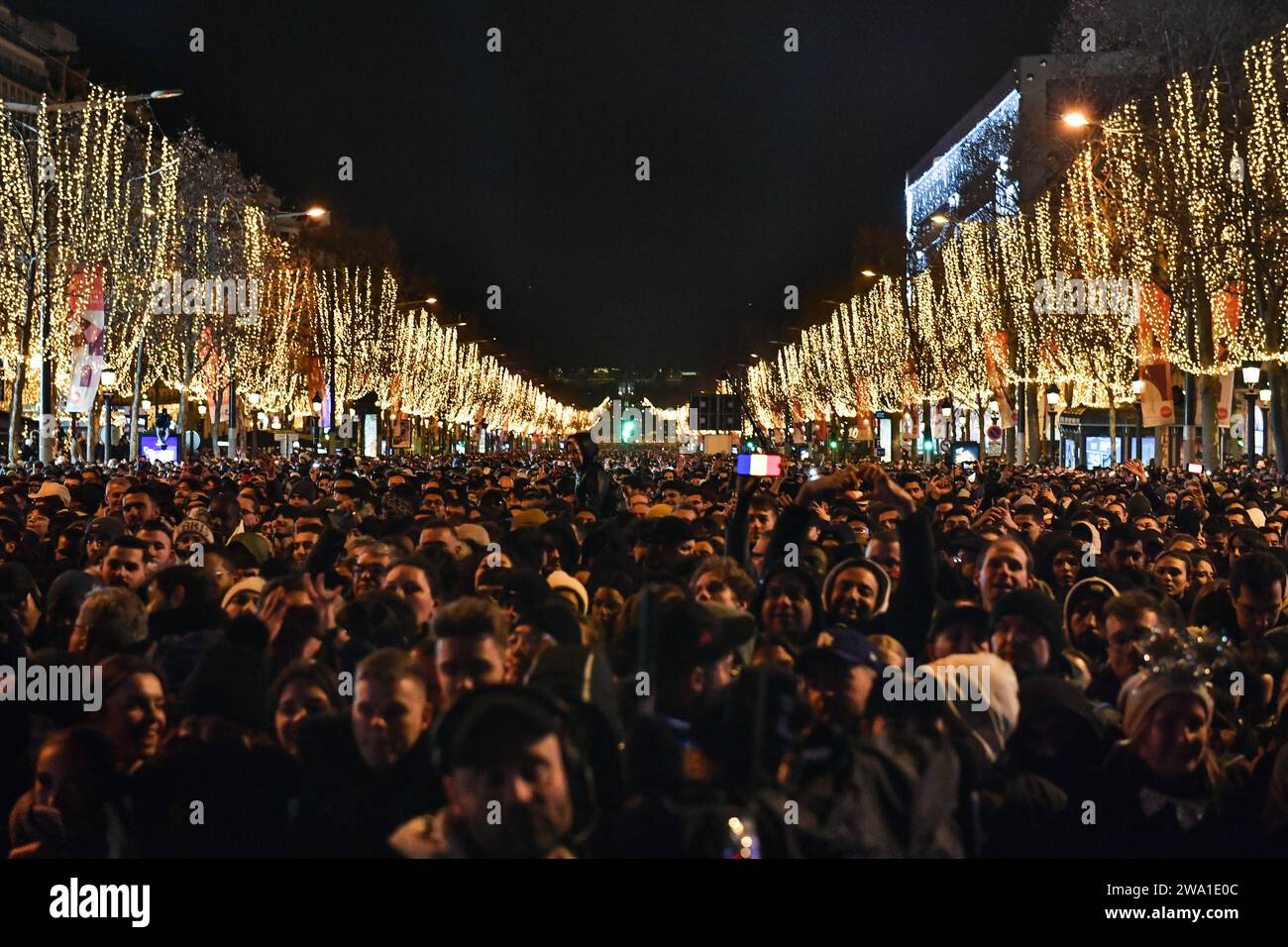 Paris, France. 01st Jan, 2025. Celebrators gather for the New Year's