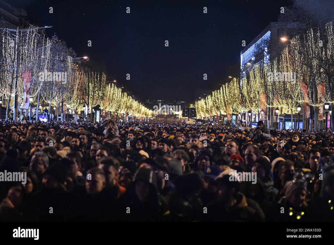 Paris, France. 01st Jan, 2025. Celebrators gather for the New Year's