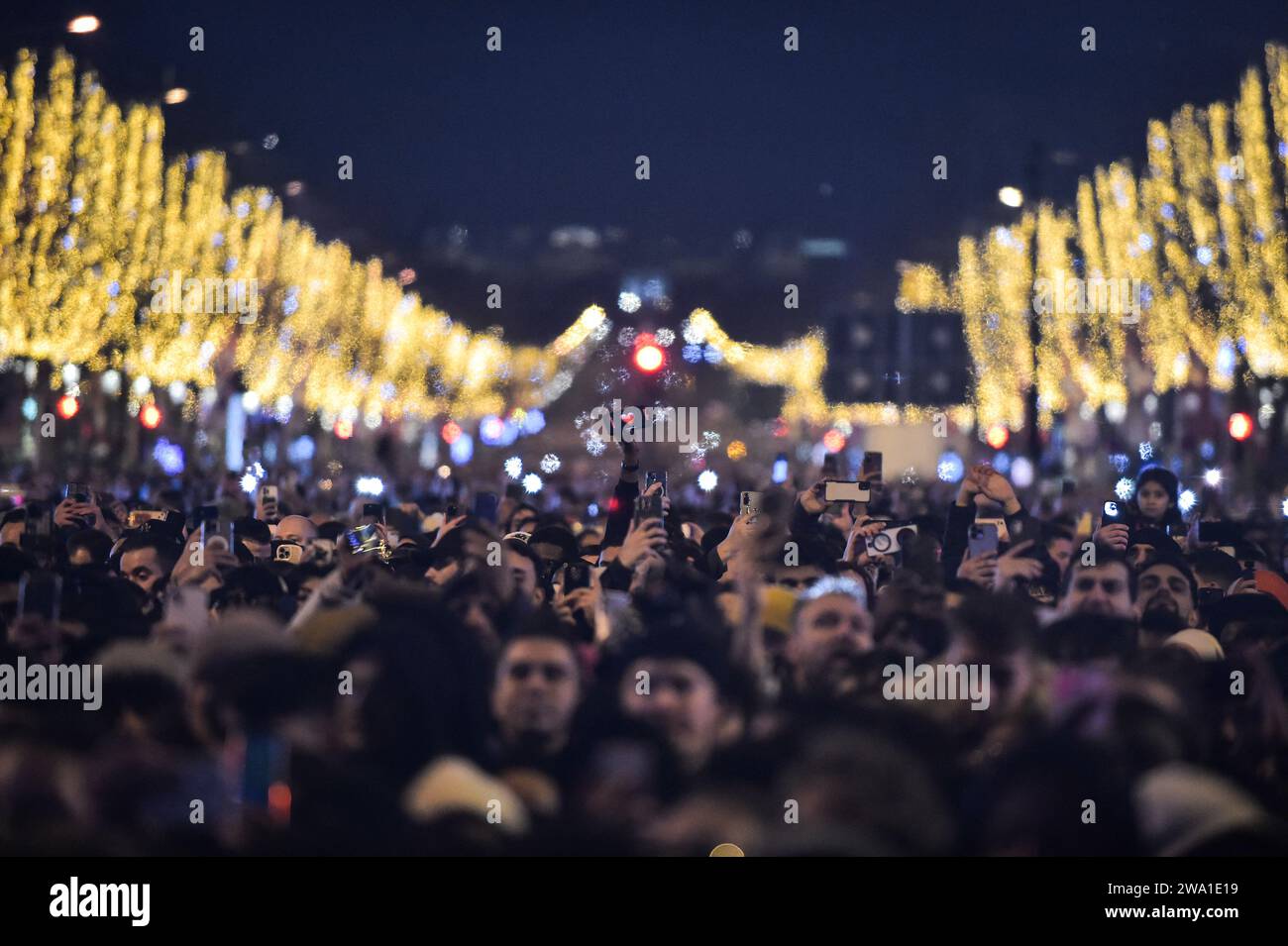 Paris, France. 01st Jan, 2025. Celebrators gather for the New Year's