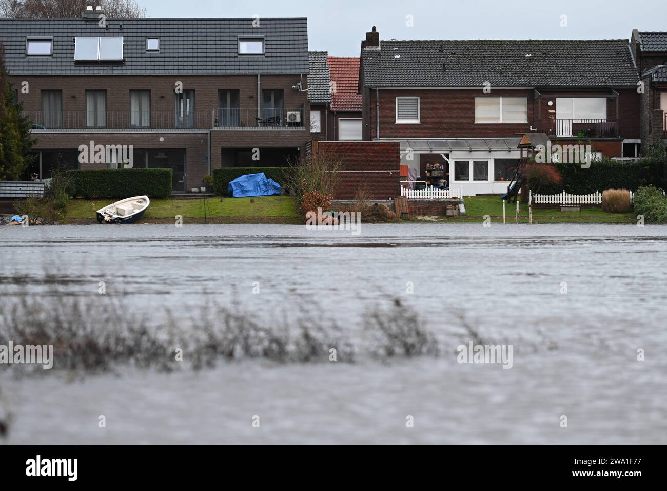 Haren, Germany. 01st Jan, 2024. The flood waters of the Ems reach right