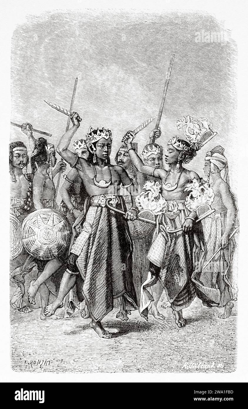 Traditional dance of kriss and sticks, Java island. Indonesia, Southeast. Six weeks in Java  1879 by Desire Charnay (1828 - 1915). Old 19th century engraving from Le Tour du Monde 1880 Stock Photo