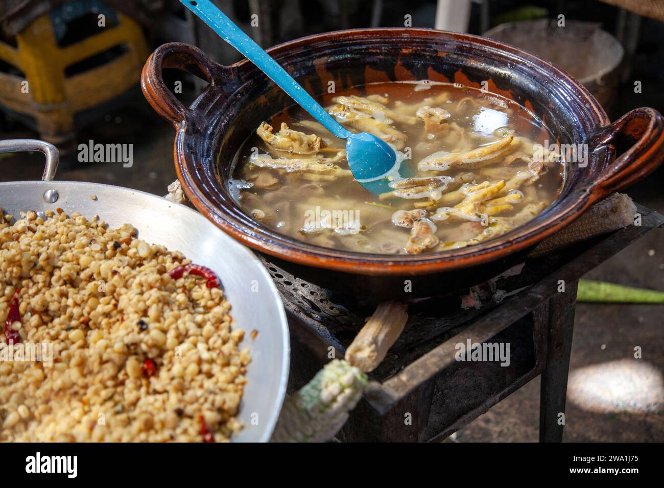 Food Vendor, Esquites and Chicken feet Broth at Jamaica market in Mexico City, Mexico Stock Photo