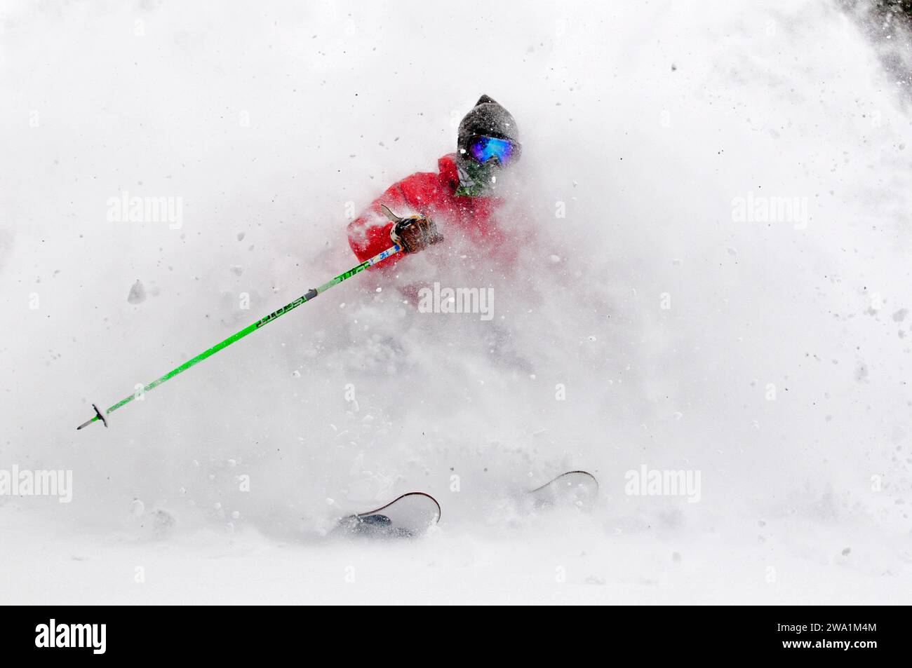 A man skiing on a powder day at a mountain resort near South Lake Tahoe, California. Stock Photo