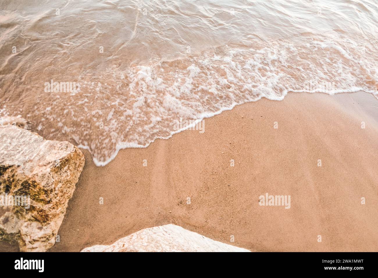 Lake Michigan Foam Waves in Summer Sandy Shoreline Stock Photo