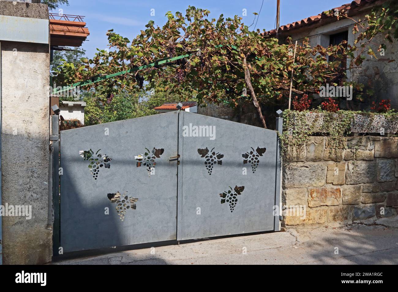 Padna Decorated metal gates at entrance to vinyard, Padna, Slovenia Stock ...