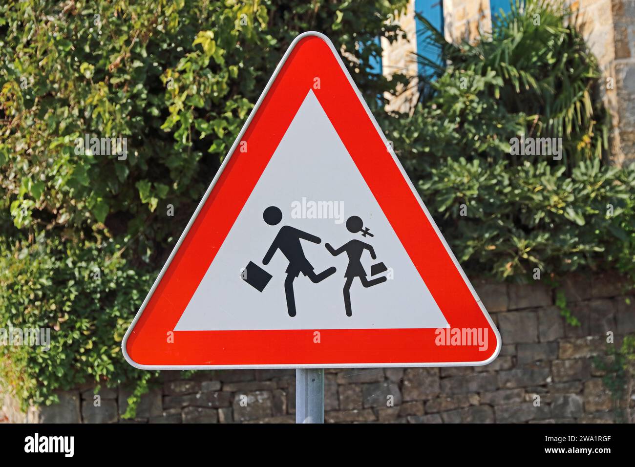 Attention, children crossing road sign Stock Photo