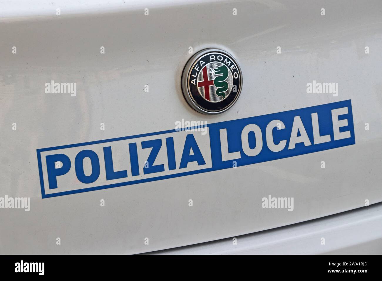 Polizia Locale logo on back of white Alfa Romeo, Italy Stock Photo