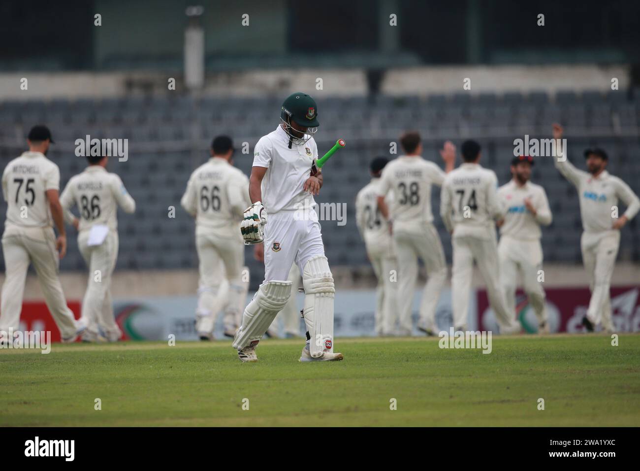 New Zealand team celebrates after dismissal of Bangladeshi captain Najmul Hossain Shanto (M) during Bangladesh-New Zealand 2nd Test Day Three at Sher- Stock Photo
