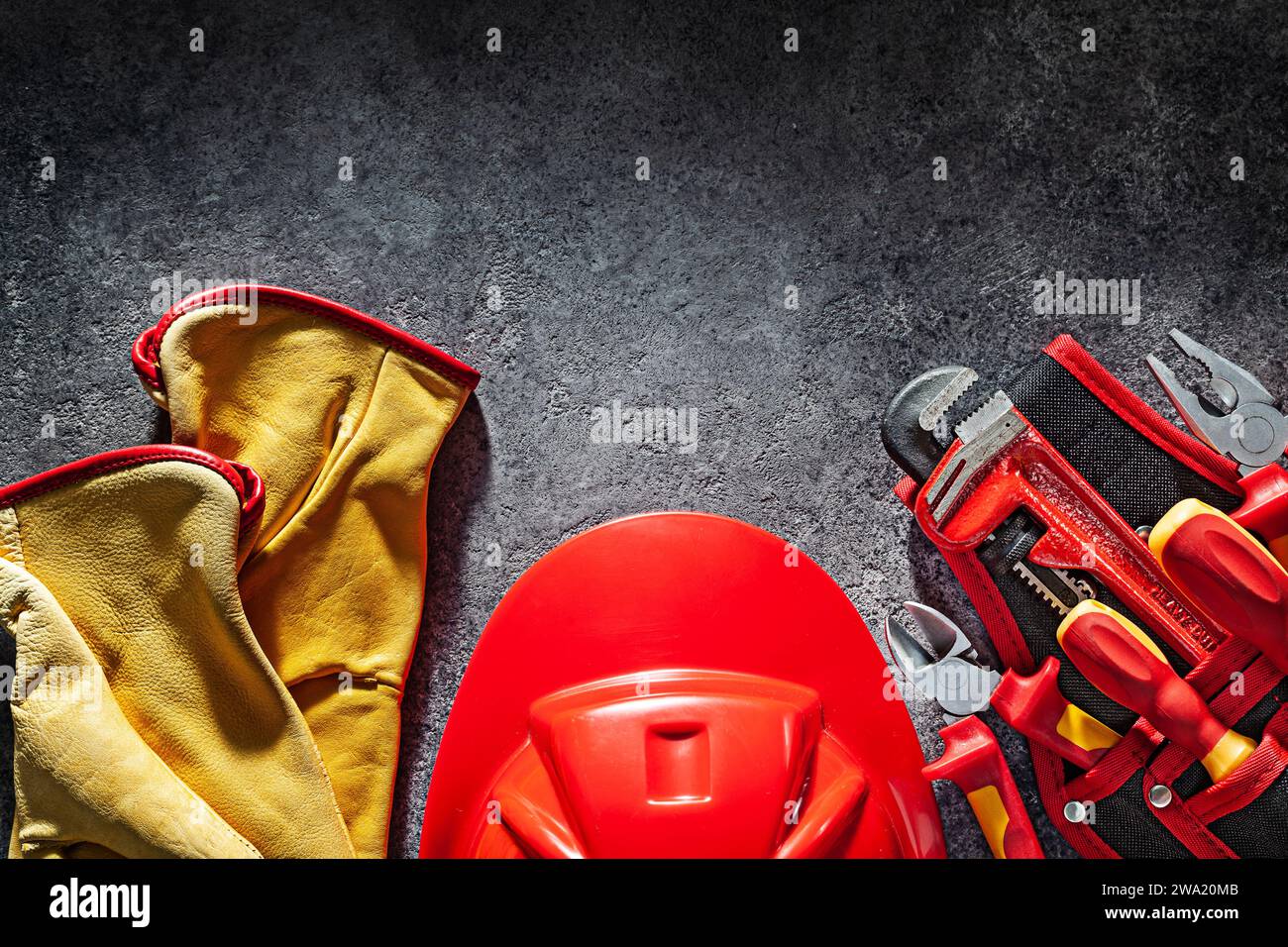 Gloves Helmet And Tools In Belt Stock Photo