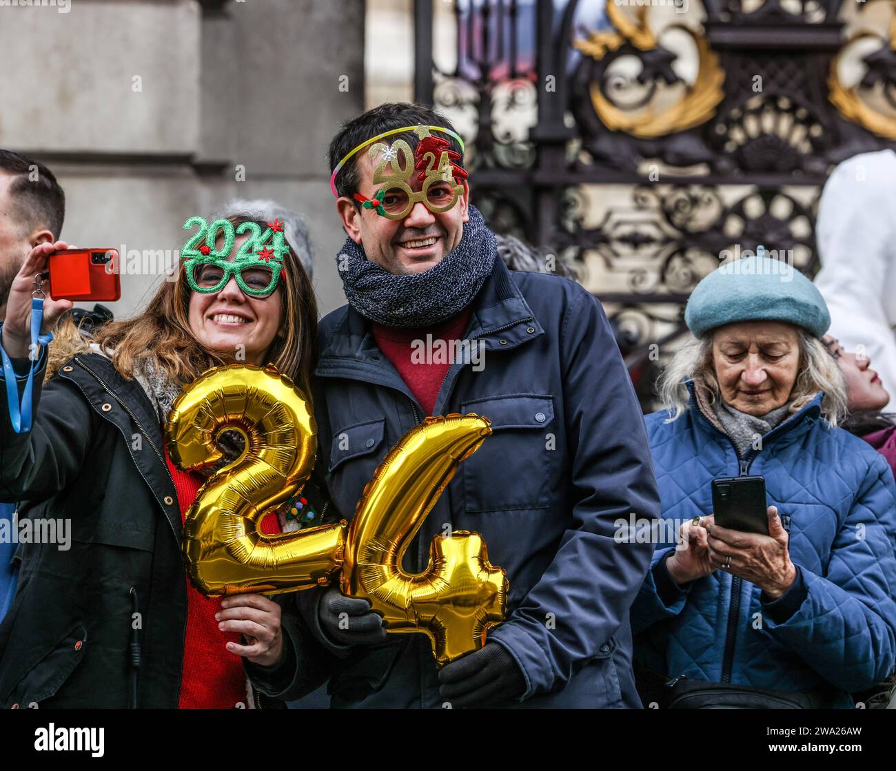 London, UK. 01st Jan, 2024. Crowds line up the streets of Central