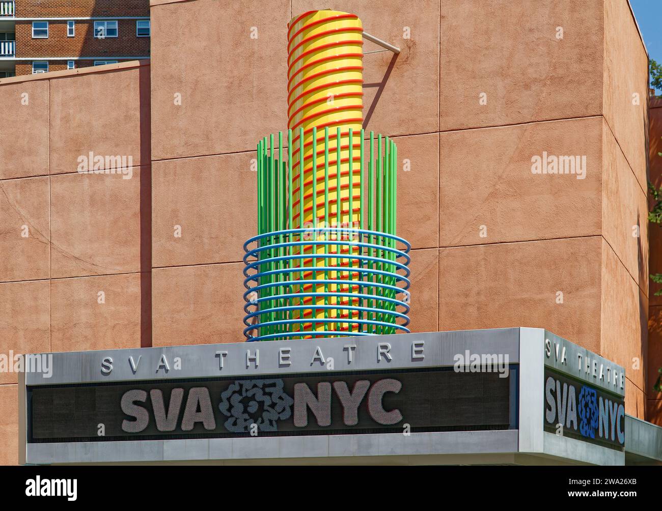 Colorful abstract sculpture sits atop the marquee of SVA Theatre, performance venue of the School of Visual Arts in Chelsea. Stock Photo