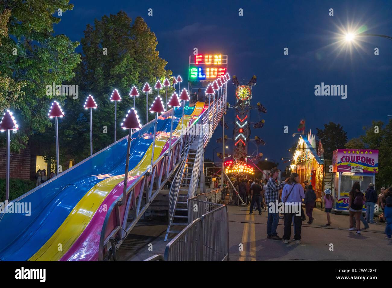 The Wonder Shows midway illuminated at night in Morden, Manitoba, Canada. Stock Photo