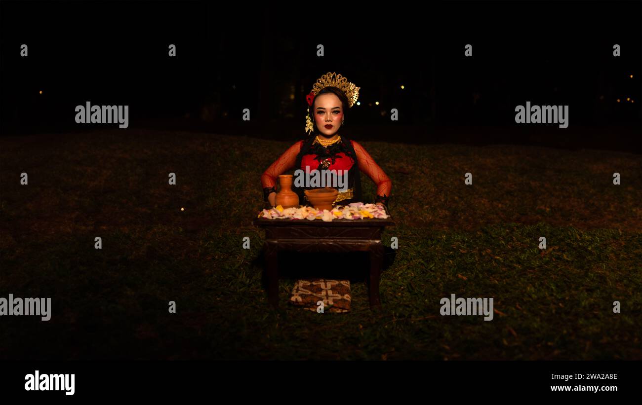 Lively Rituals a female dancer looks focused on her ritual with a peaceful facial ...