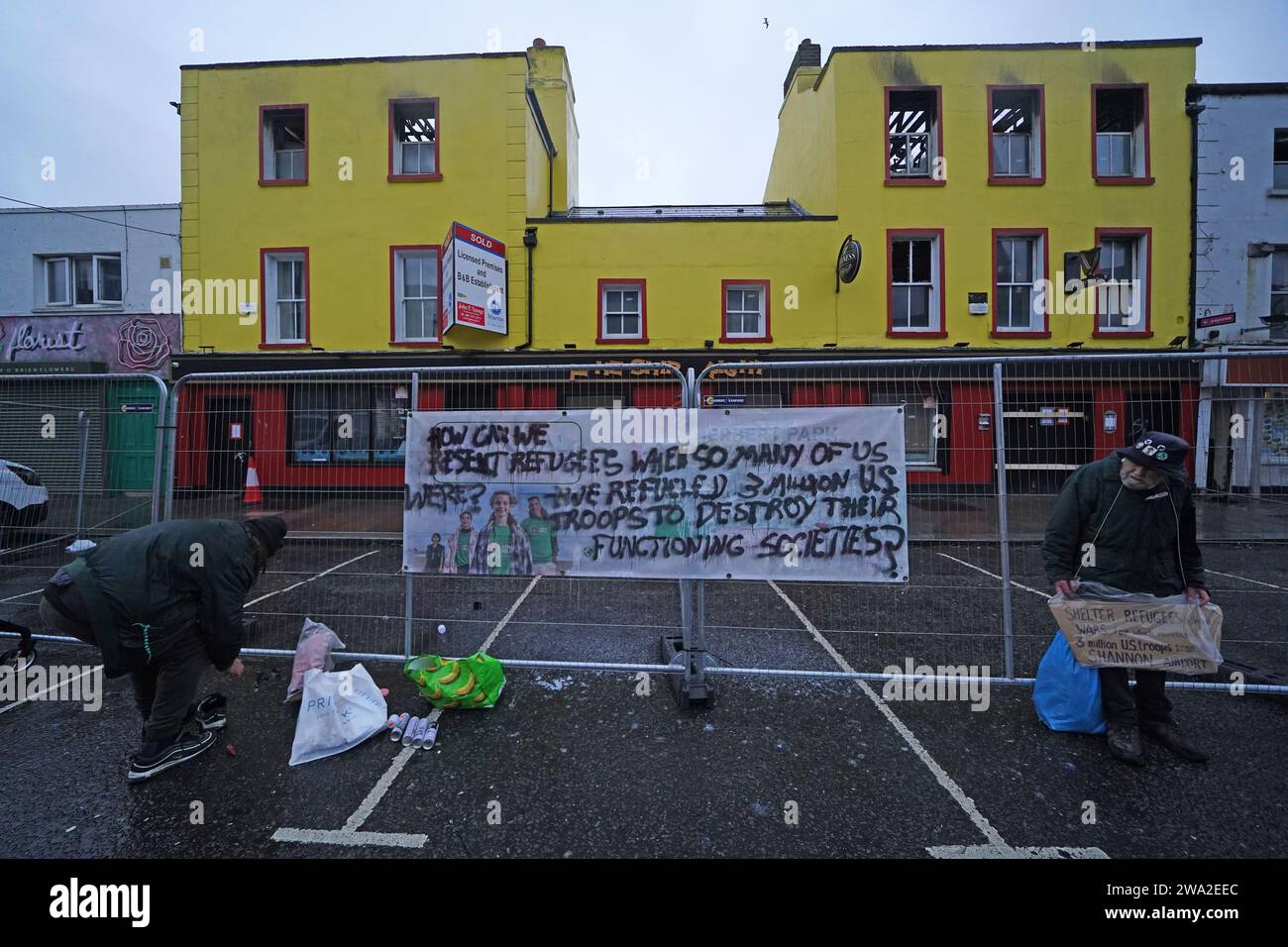 Protesters put up a sign at former pub on Thorncastle Street in the