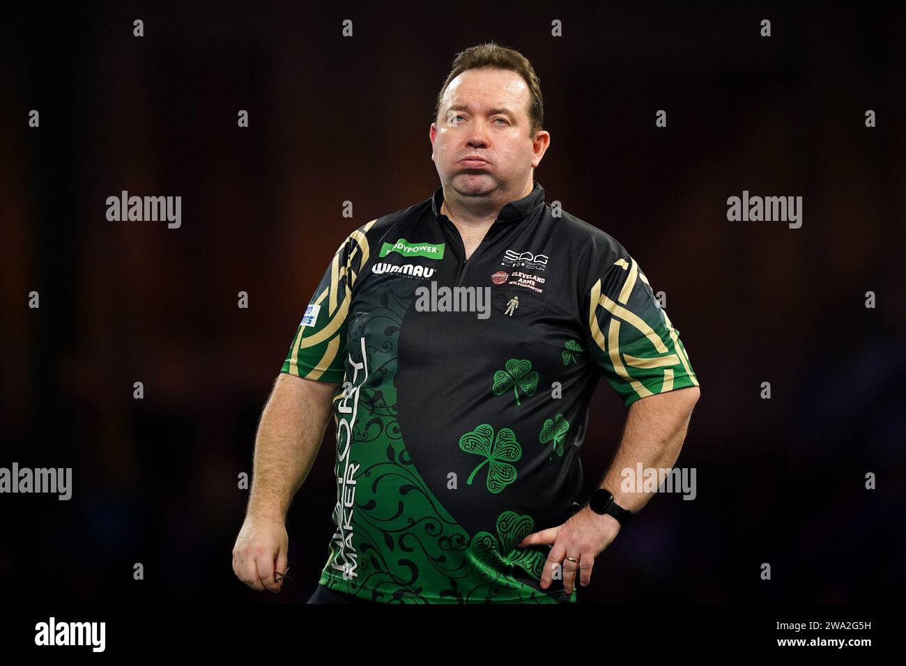 Brendan Dolan in action against Luke Littler (not pictured) on day