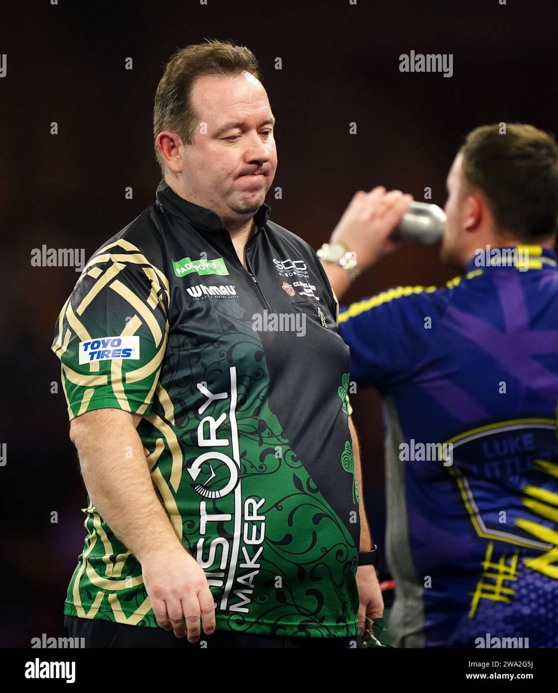 Brendan Dolan in action against Luke Littler (not pictured) on day ...