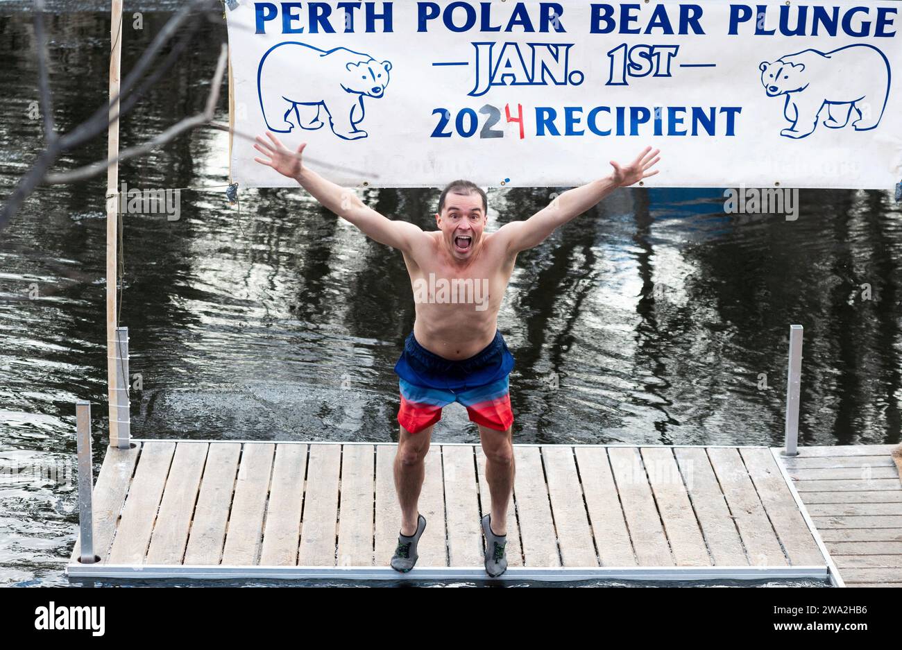 A Polar Bear plunger rings in the New Year with a jump into the Tay