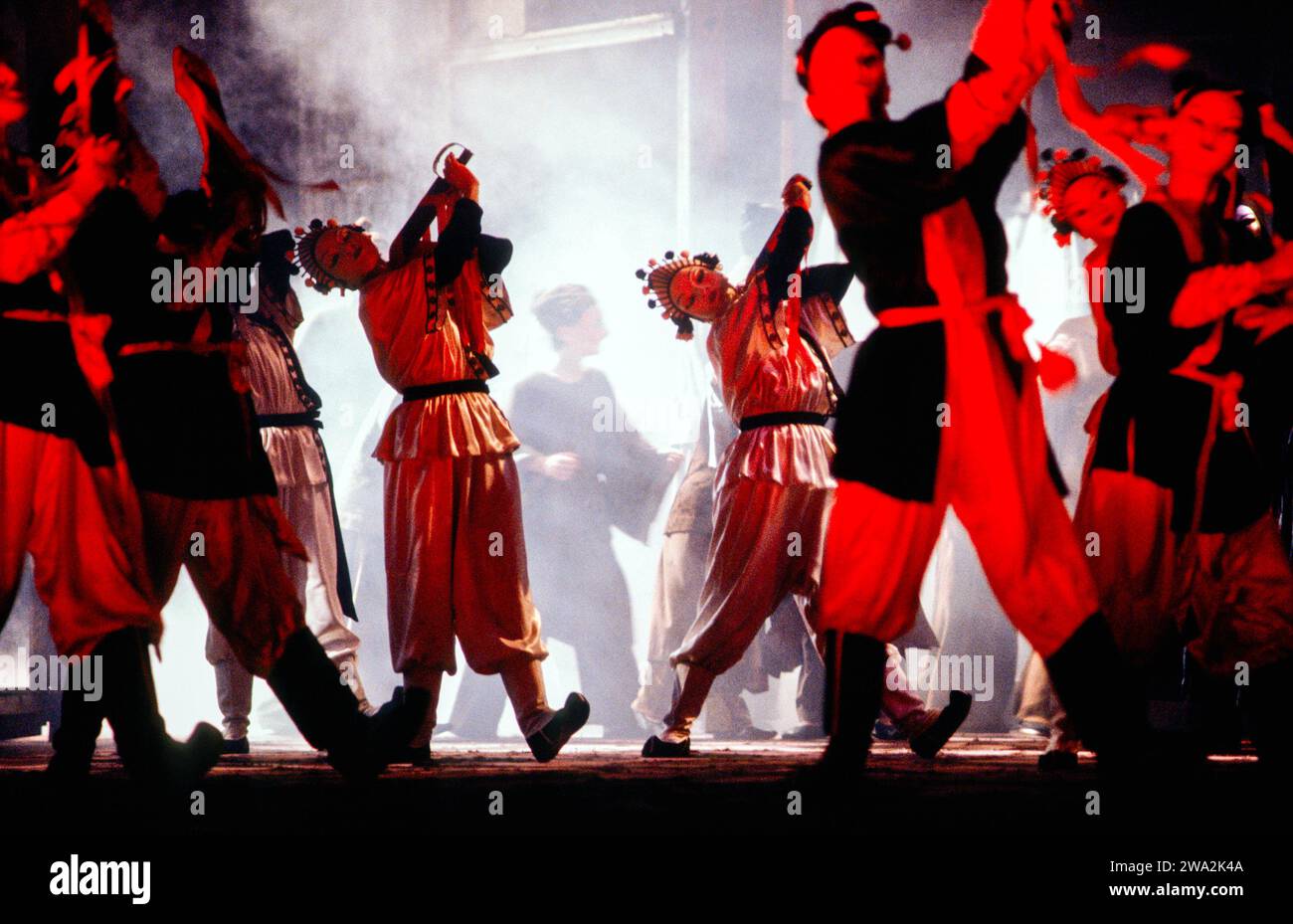 dancers in TURANDOT at The Royal Opera, Covent Garden, London WC2  21/01/1986  music: Giacomo Puccini  libretto: Giuseppe Adami & Renato Simoni  conductor: Jacques Delacote  design: Sally Jacobs  lighting: F Mitchell Dana  choreography: Kate Flatt  director: Andrei Serban Stock Photo