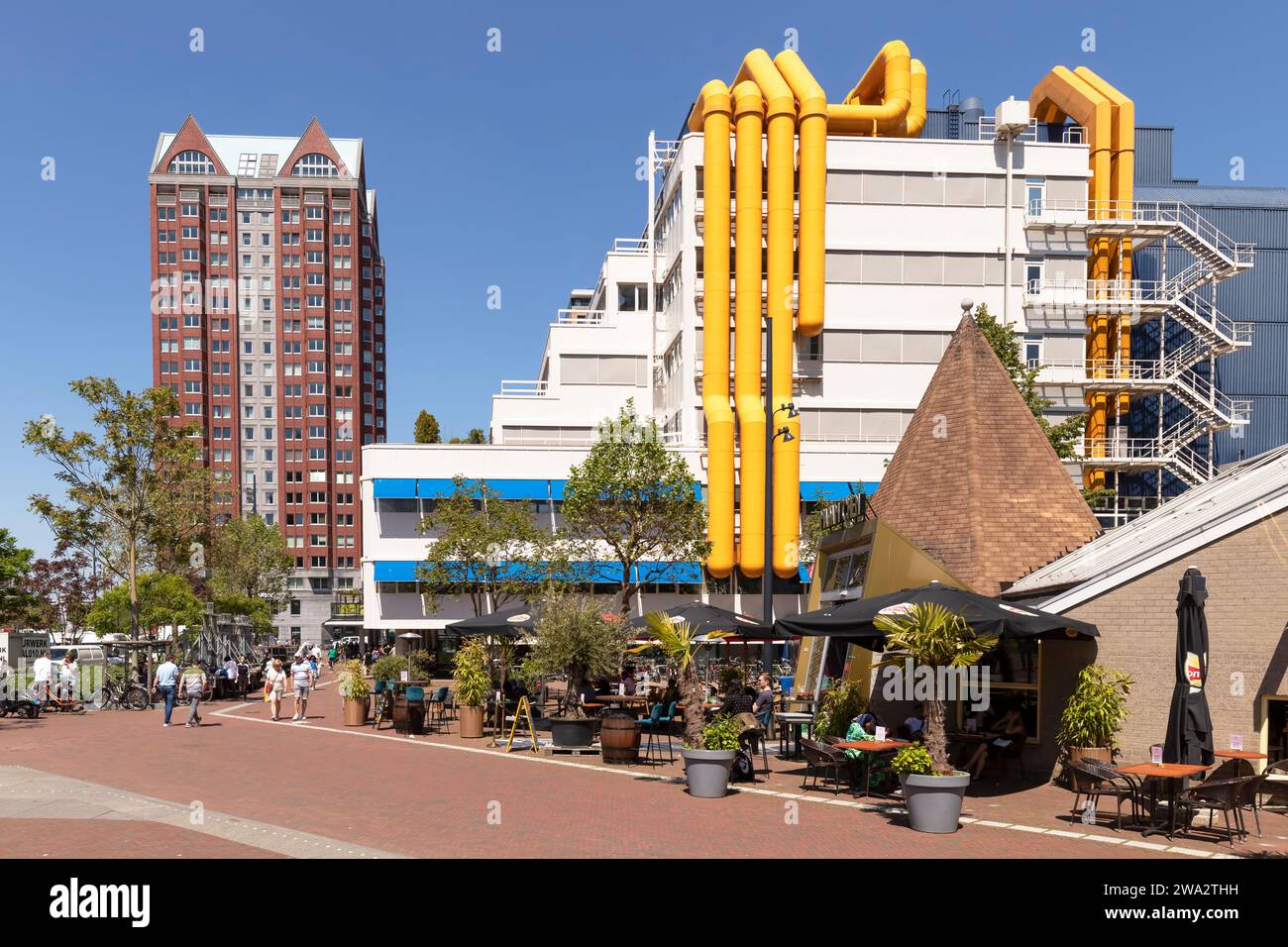 Central Library and in the background the residential tower Statendam in the Blaak district of Rotterdam. Stock Photo