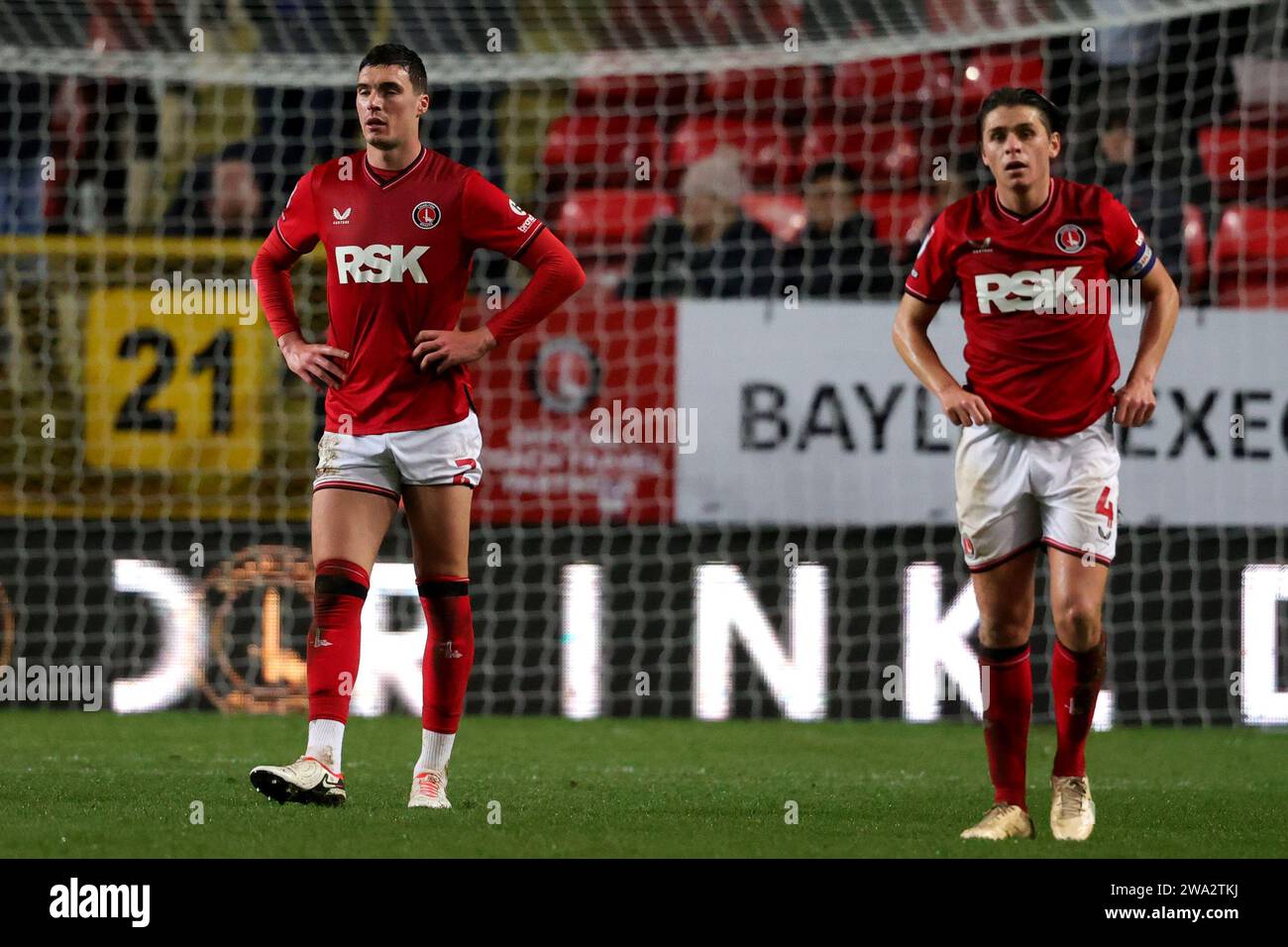 Charlton Athletic's Lloyd Jones (left) and George Dobson react after conceding a second goal during the Sky Bet League One match at The Valley, London. Picture date: Monday January 1, 2024. Stock Photo