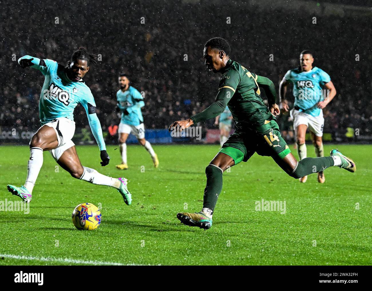 Mickel Miller of Plymouth Argyle crosses the ball   during the Sky Bet Championship match Plymouth Argyle vs Watford at Home Park, Plymouth, United Kingdom, 1st January 2024  (Photo by Stan Kasala/News Images) Stock Photo