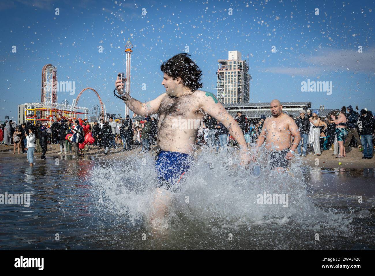 New York, New York, USA. 1st Jan, 2024. Polar Bear Club swimmers make