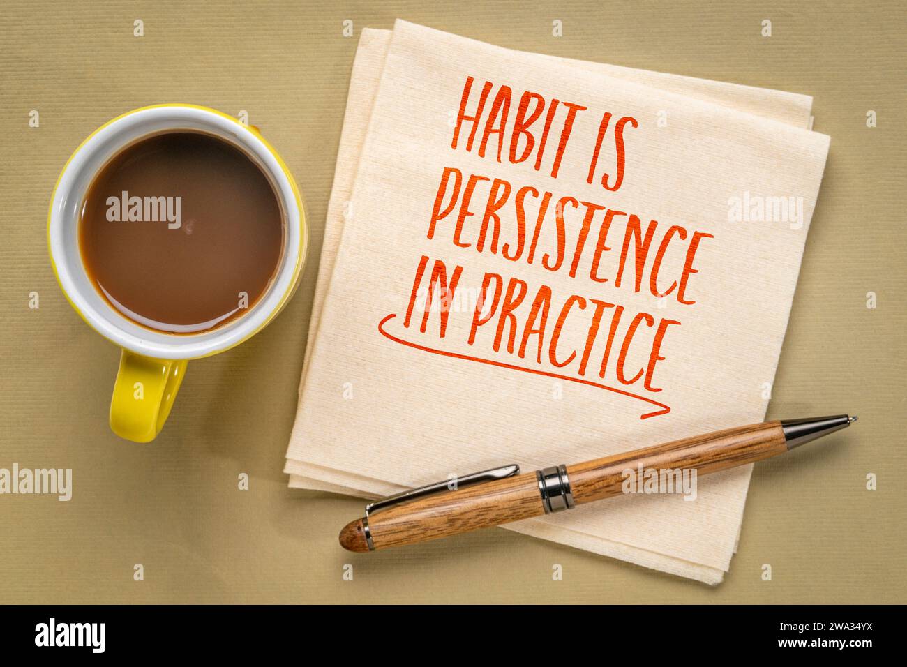 habit is a persistence in practice - inspirational reminder note on napkin, personal development concept Stock Photo