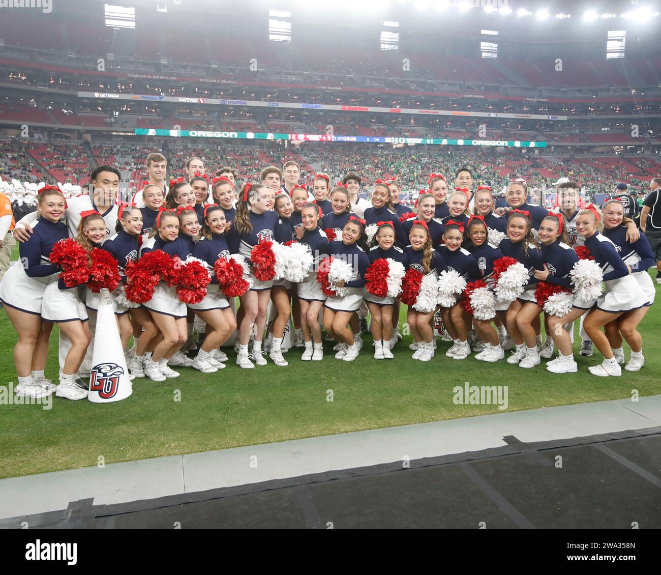 Glendale, Arizona, USA. 1st Jan, 2024. Liberty Flames cheerleader pose