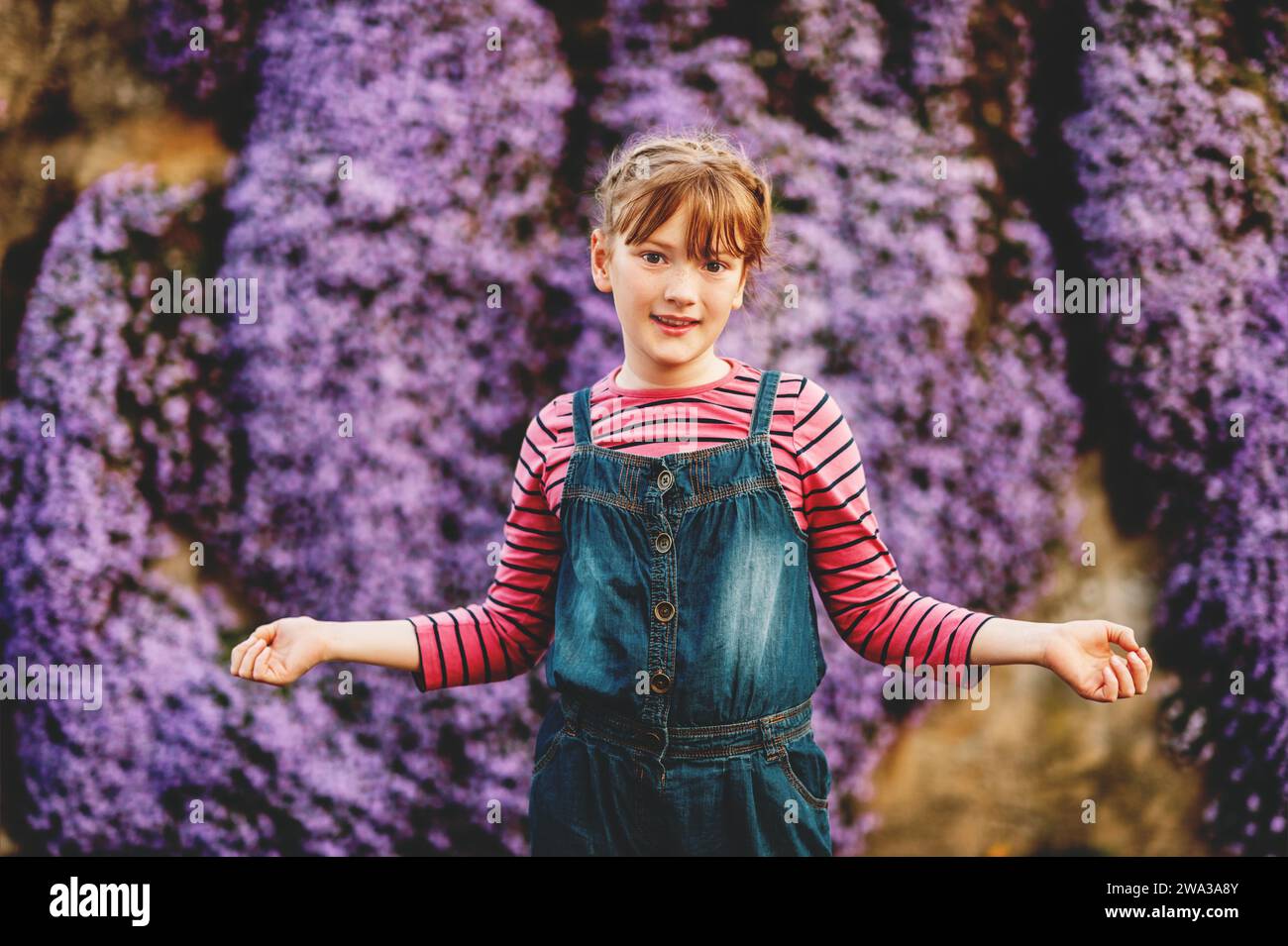 Summer portrait of young happy kid girl wearing denim overalls Stock ...