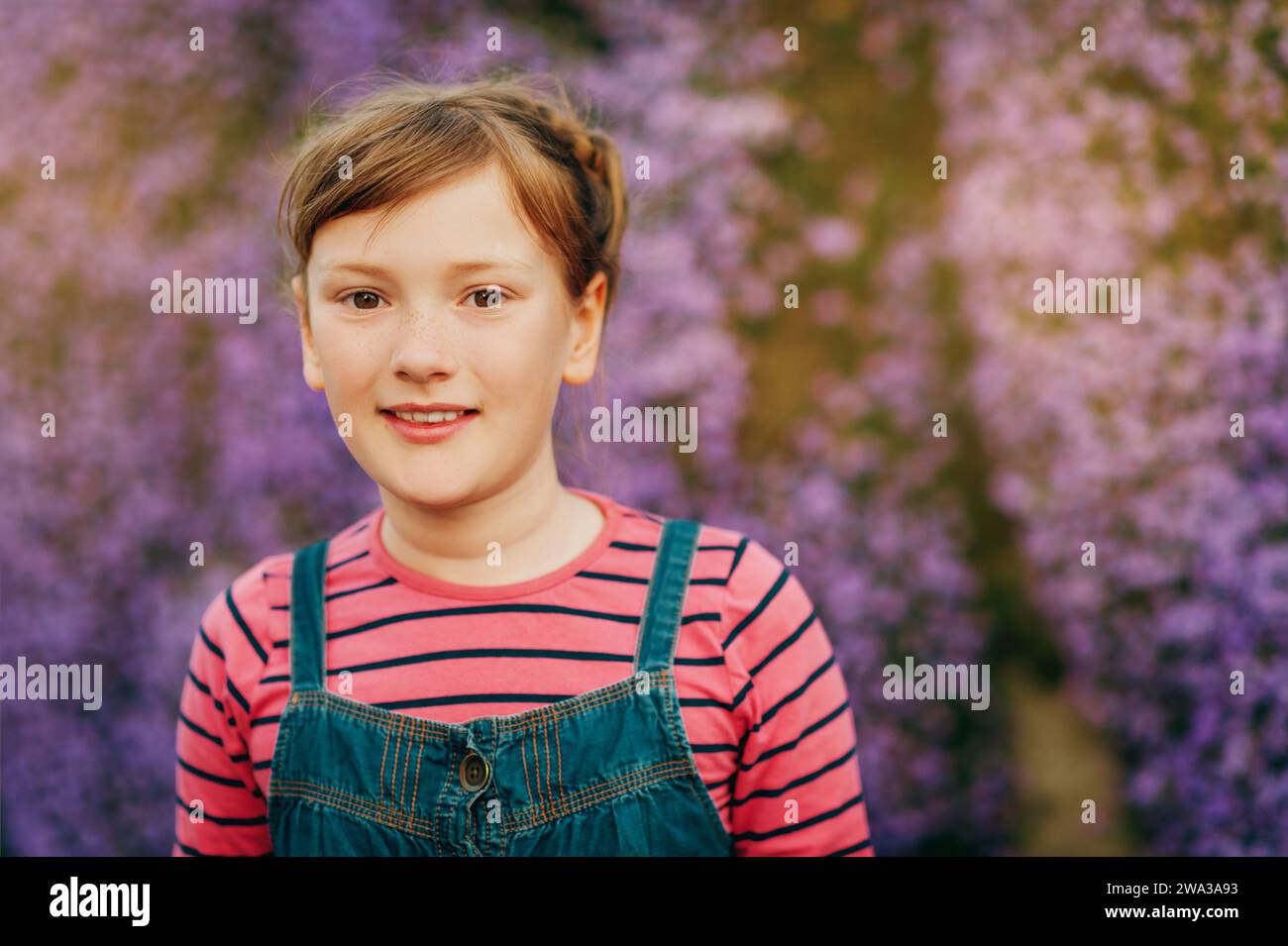 Summer portrait of young happy kid girl wearing denim overalls Stock ...