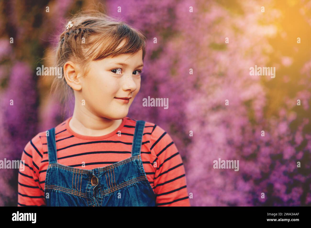 Summer portrait of young happy kid girl wearing denim overalls Stock ...