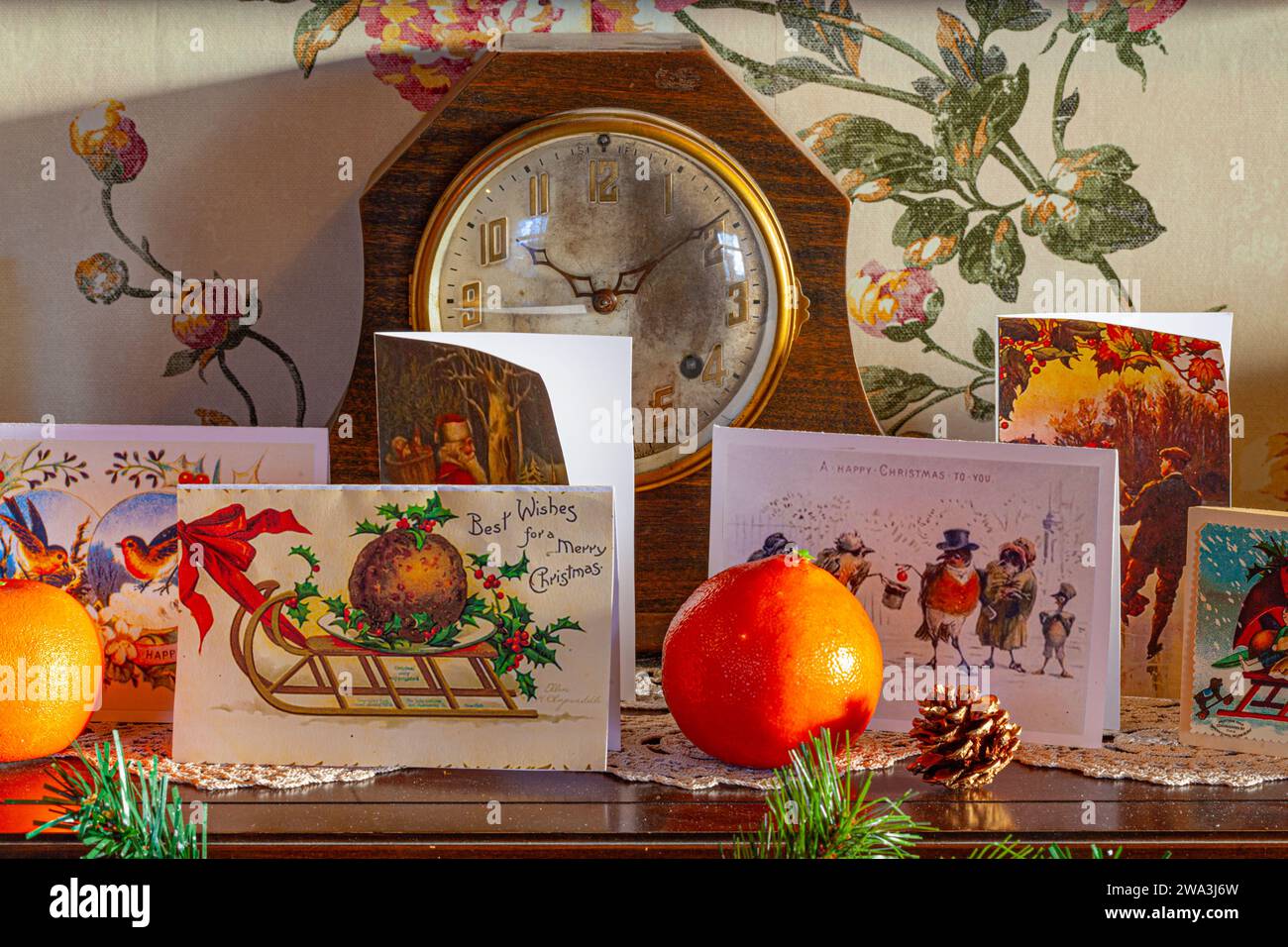 Antique Mantle Clock with period Christmas cards and decorations at the Britannia Ship Yard in Steveston Canada Stock Photo