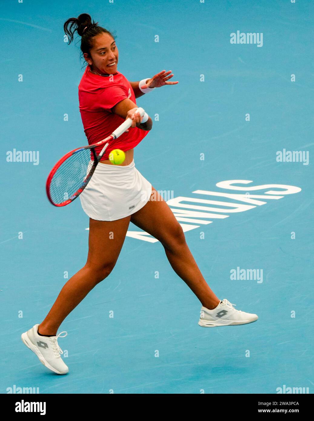 Daniela Seguel of Chile plays a forehand return to Maria Sakkari of