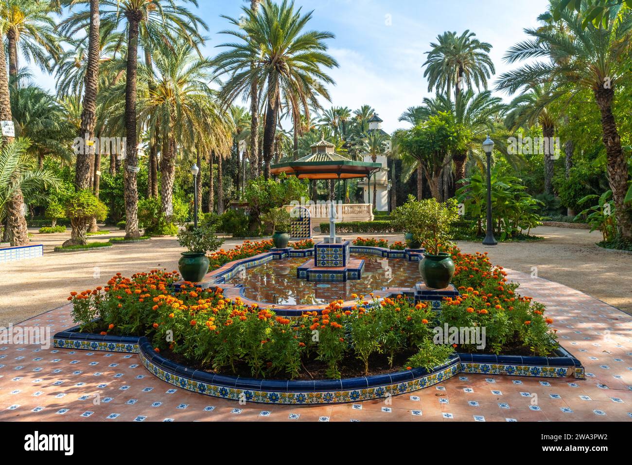 Temple or pergola with a fountain in the Palm Grove Park in the city of Elche. Spain Stock Photo