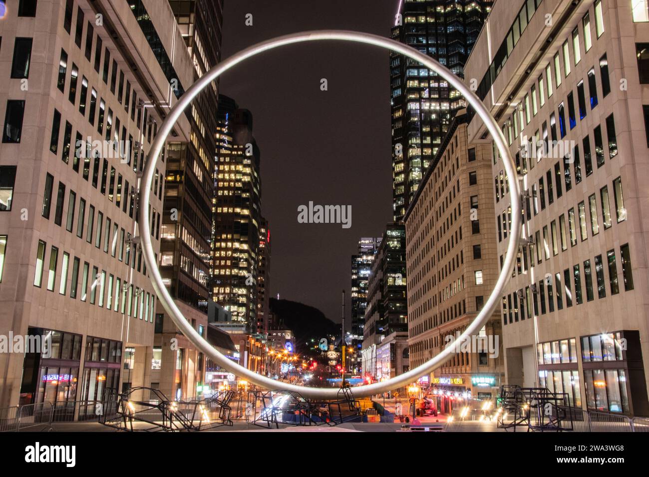 Gigantic Ring at night at Esplanade Place Ville Marie in downtown Montreal, Quebec, Canada Stock