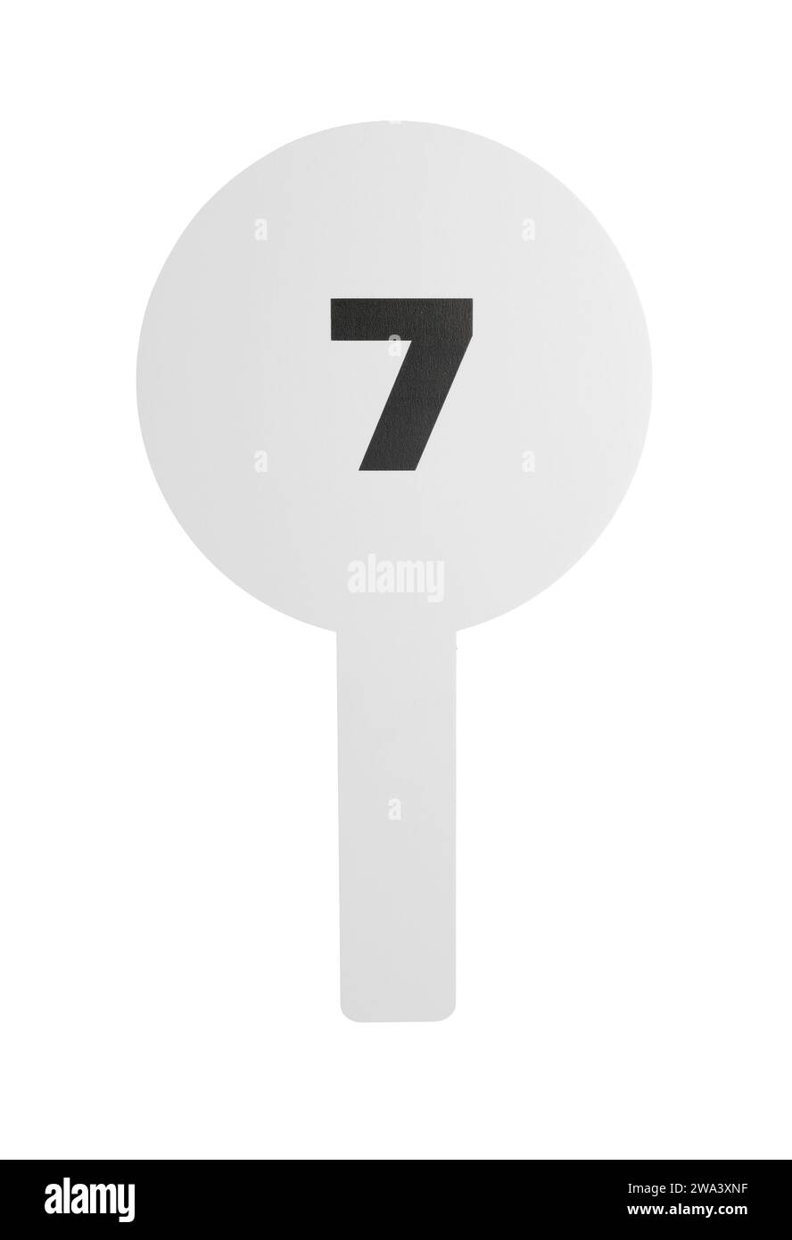 Auction paddle with number 7 isolated on white Stock Photo