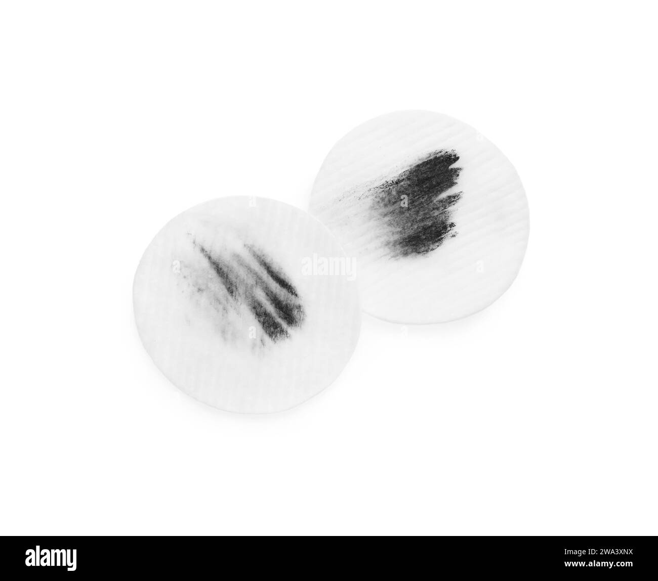Dirty cotton pads after removing makeup on white background, flat lay Stock Photo
