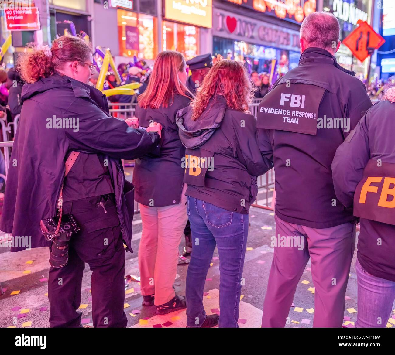 NEW YORK, N.Y. – December 31, 2023: Federal Bureau of Investigation personnel are seen in Times Square during a New Year’s Eve celebration. Stock Photo