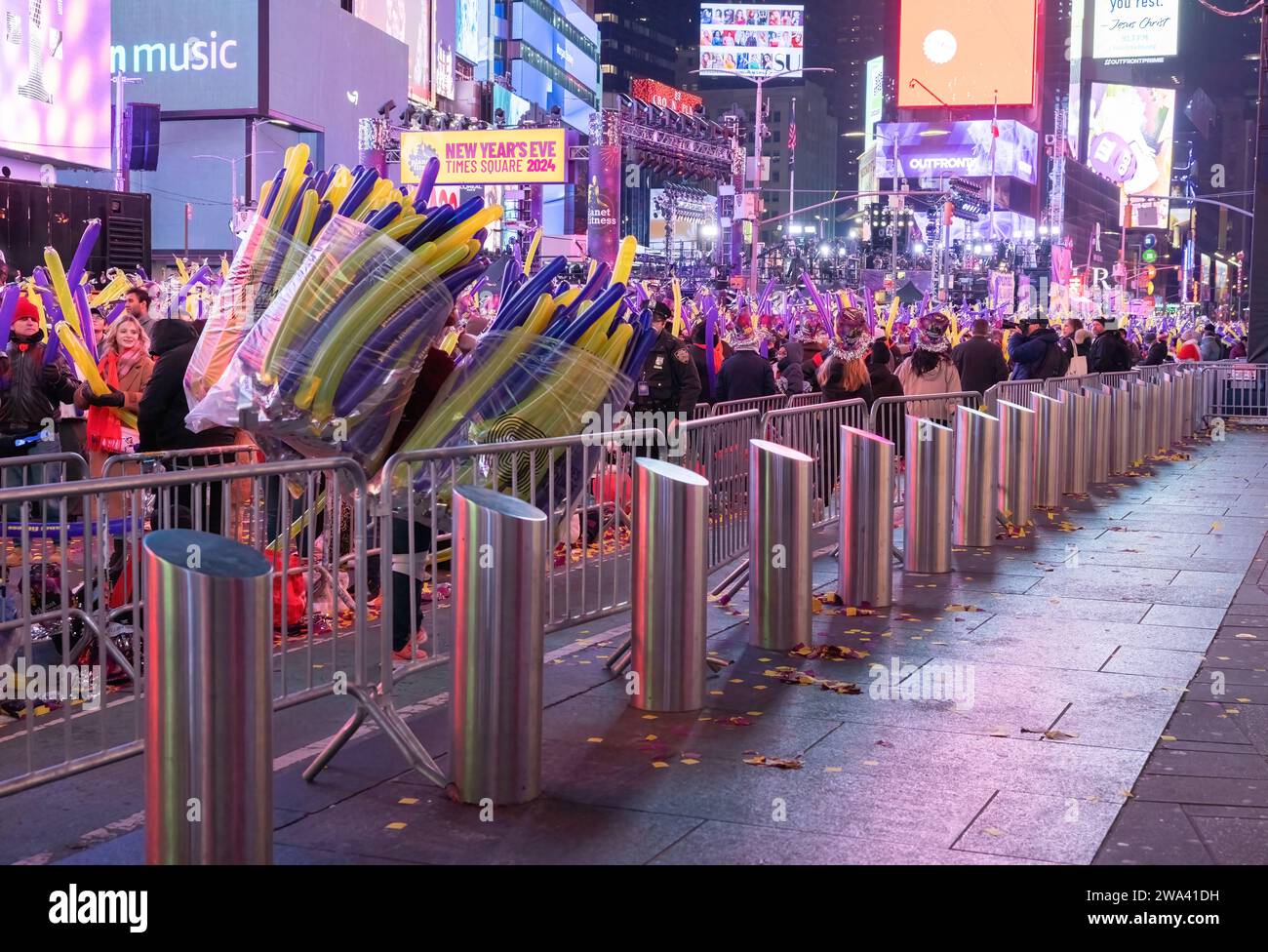 NEW YORK, N.Y. – December 31, 2023: New Year’s Eve revelers gather in Times Square. Stock Photo