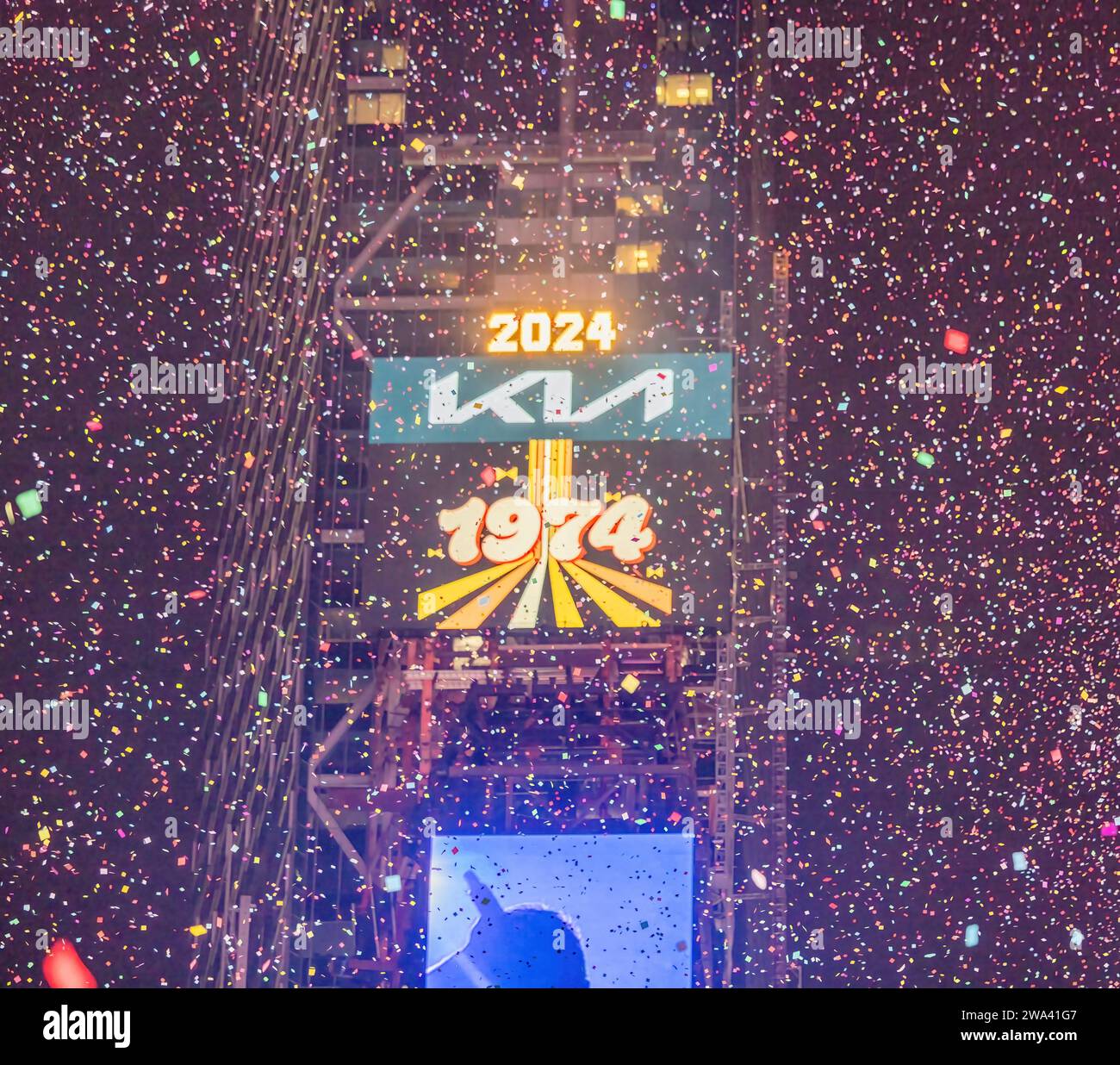 NEW YORK, N.Y. – January 1, 2024: Confetti falls over Times Square in the opening moments of 2024. Stock Photo