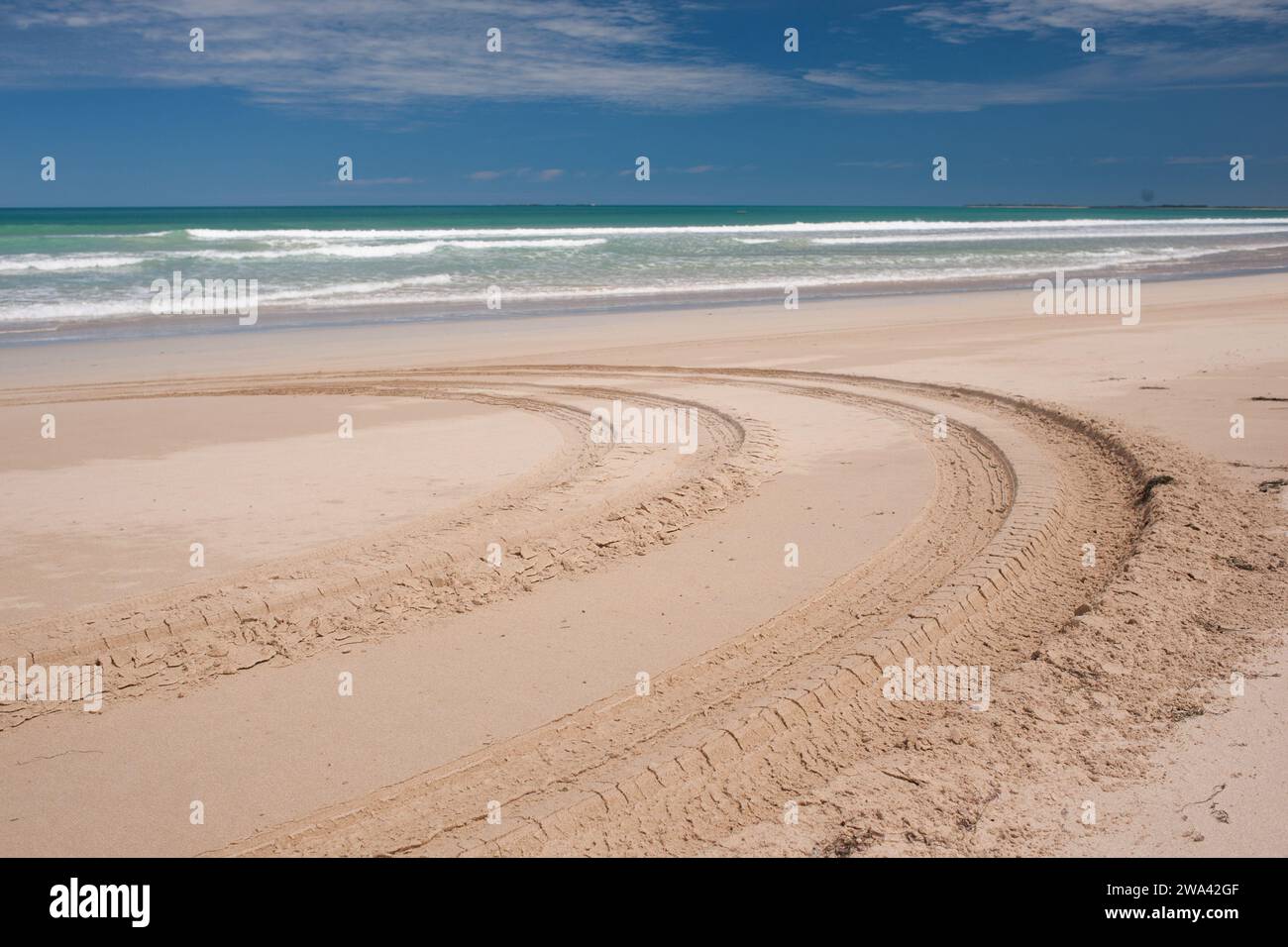 4x4 track marks on Long Beach in Robe. Stock Photo