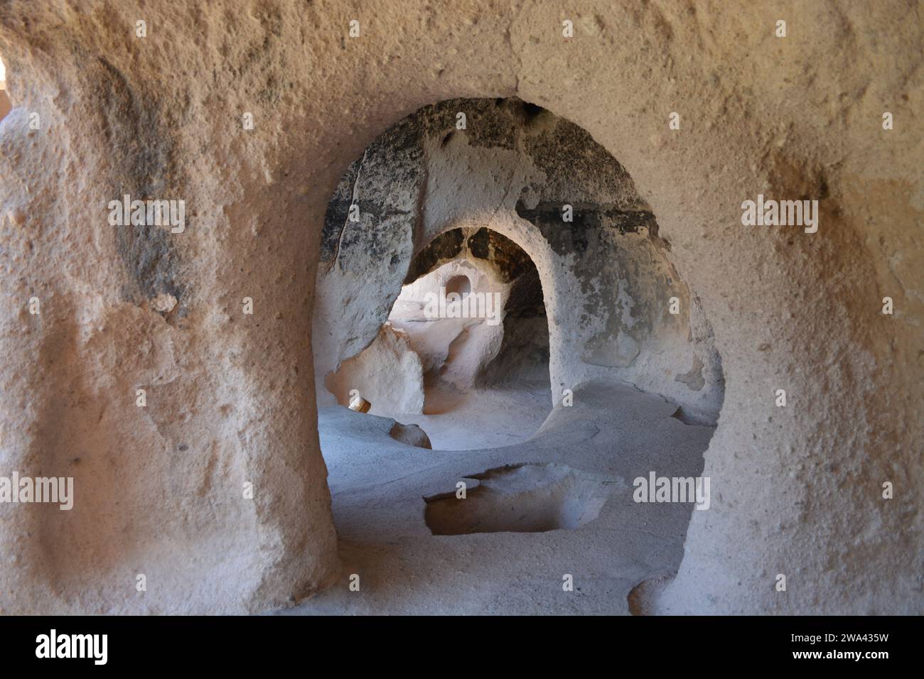 Inside one of the Puye Cliff Dwellings. The ruins of an abandoned