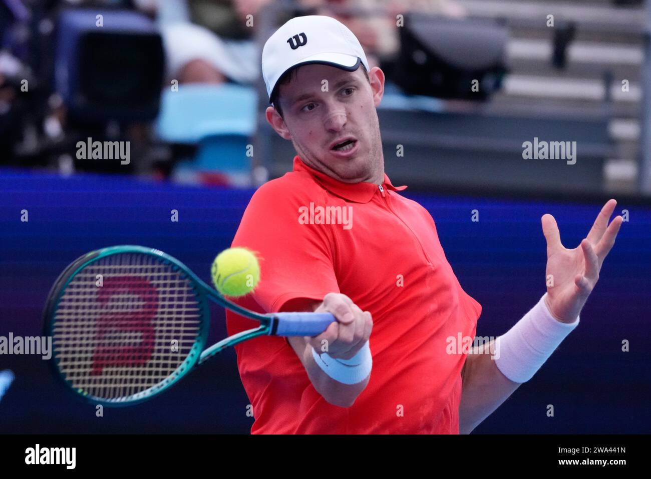 Nicolas Jarry of Chile plays a forehand return to Stefanos Sakellaridis