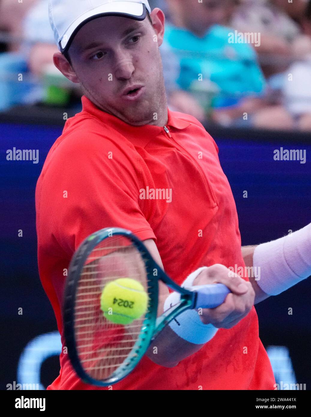 Nicolas Jarry of Chile plays a forehand return to Stefanos Sakellaridis