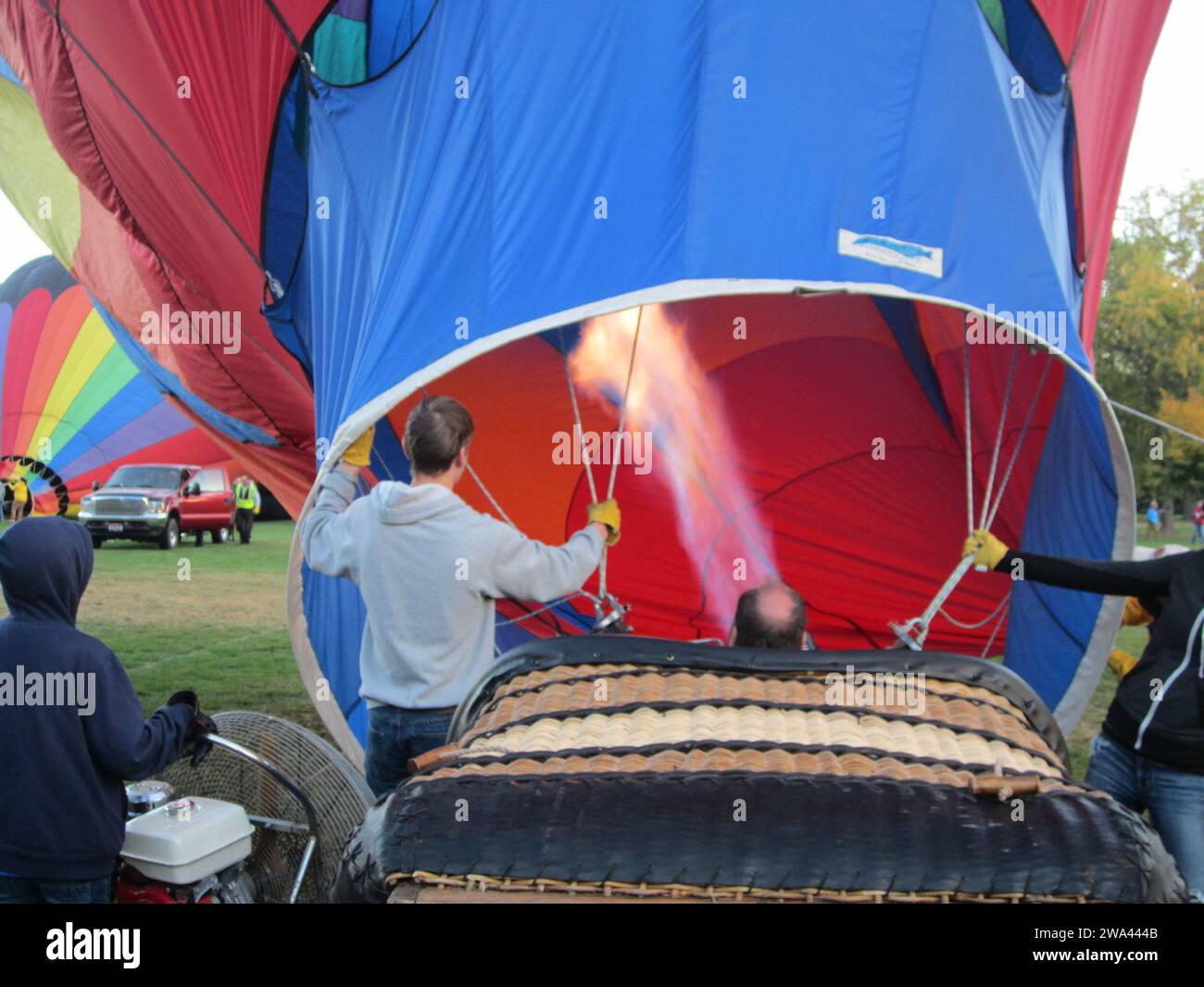 Colorful Hot Air Balloons filling up with hot air before taking flight