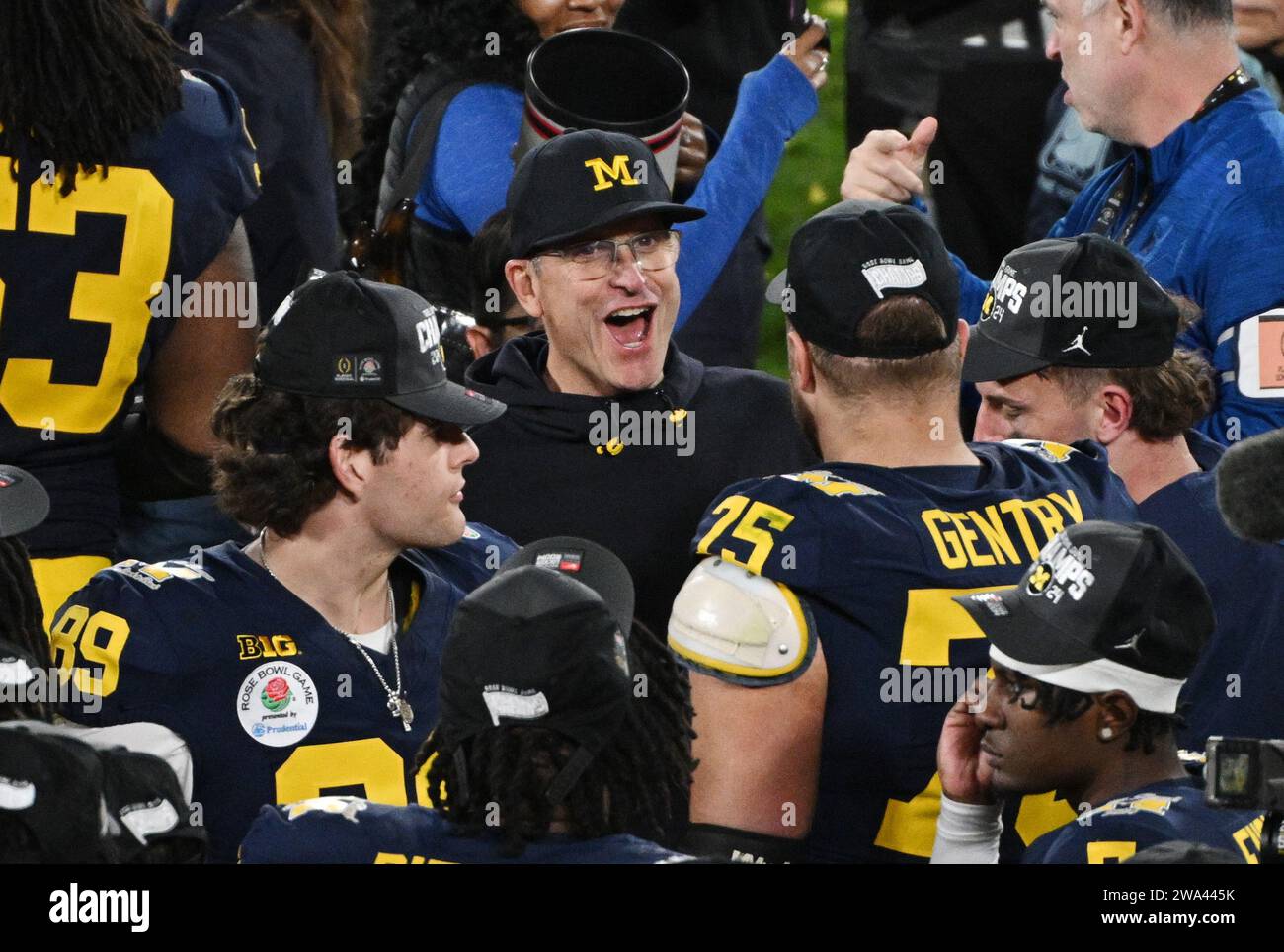 Pasadena, United States. 01st Jan, 2024. Michigan Wolverines head coach Jim Harbaugh celebrates with his players after defeating the Alabama Crimson Tide 27-20 in the 2024 Rose Bowl NCAA football game at the Rose Bowl in Pasadena, California on Monday, January 1, 2024. Photo by Jon SooHoo/UPI Credit: UPI/Alamy Live News Stock Photo
